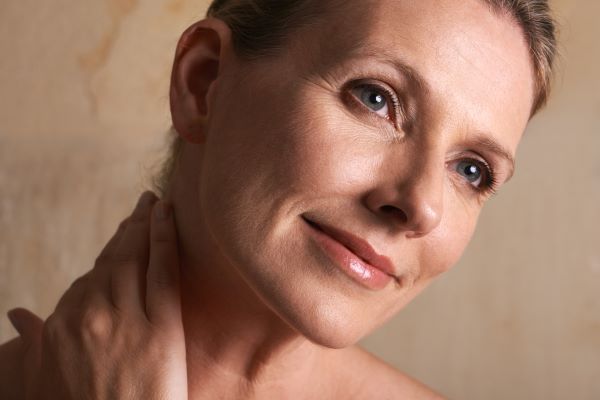 Woman smiling after facial